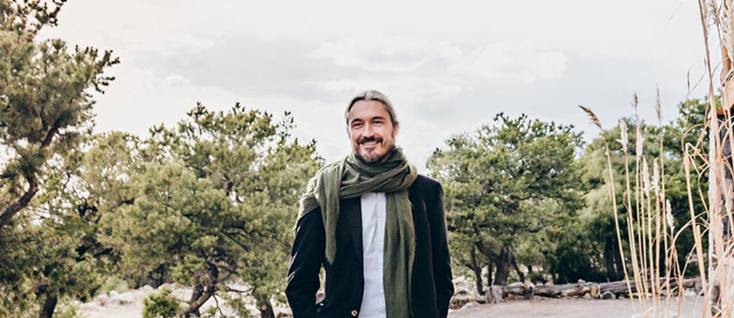 Thomas Hubl standing outside smiling